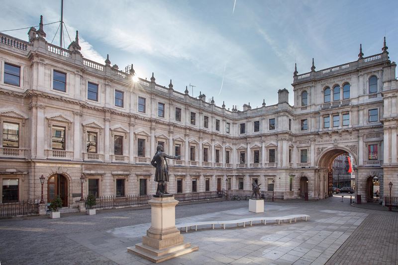A landscape photograph of the Burlington House courtyard during the day